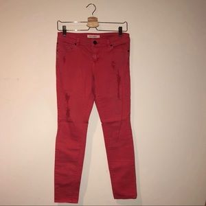 Coral ripped jeans